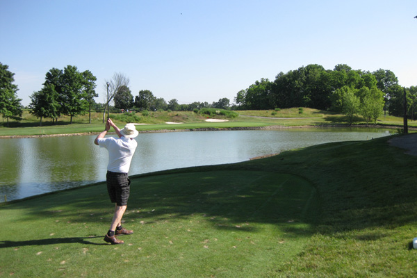 Cam shooting at the dreaded par 3 at Lassing Point